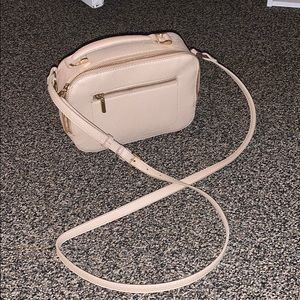 Nude cross body bag with gold metal
